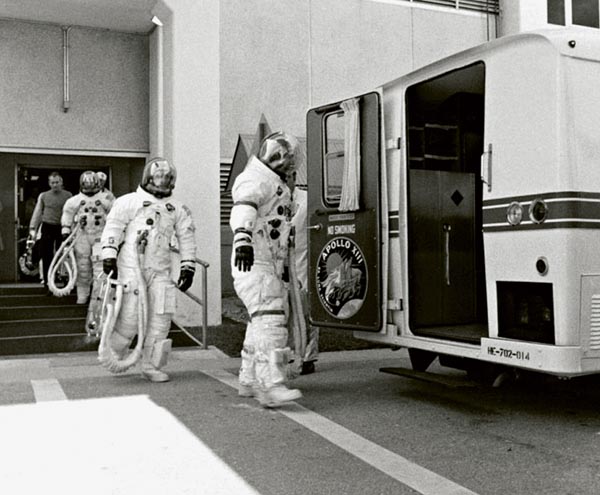 The astronauts of Apollo 13 in full space suits