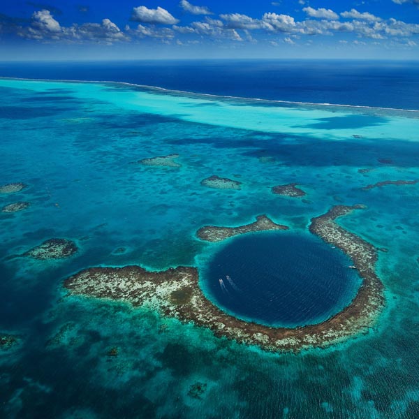 A photo of the Great Belize Blue Hole in the Caribbean Sea by Yann Arthus Bertrand
