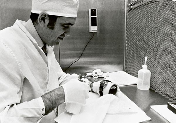 A NASA engineer testing a Speedmaster