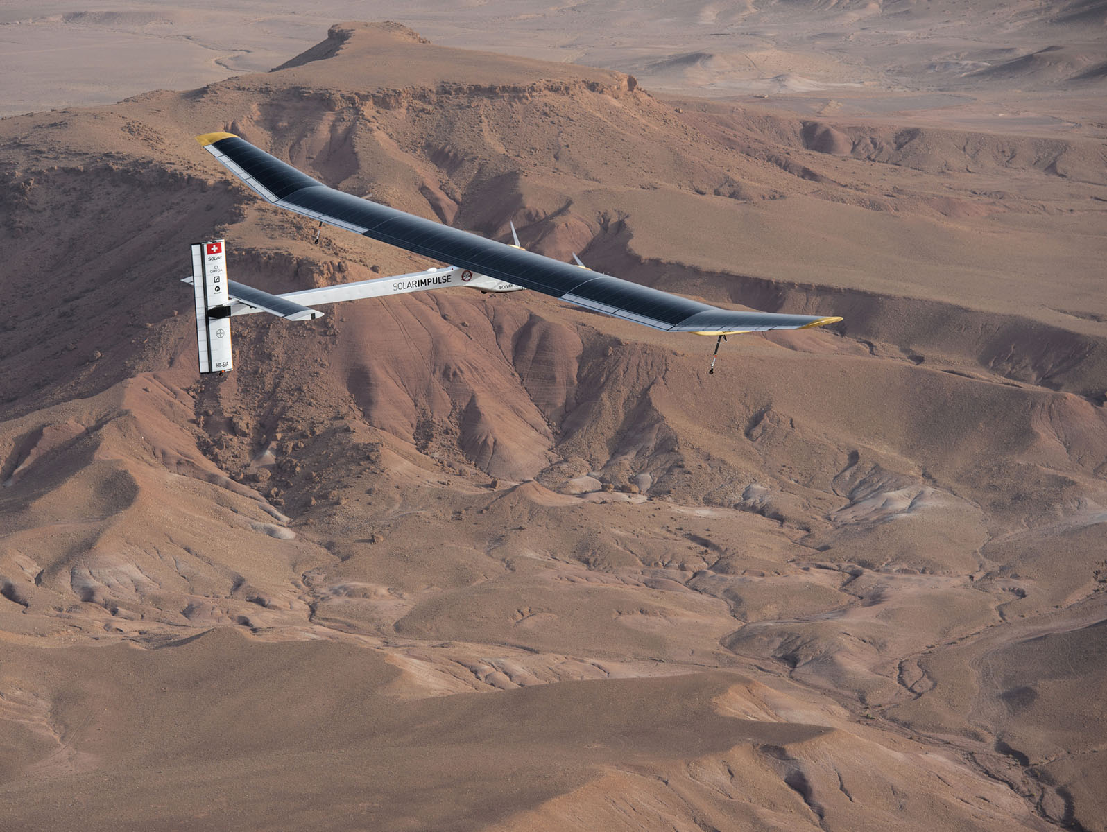 The Solar impulse aircraft, in the Moroccan desert sky